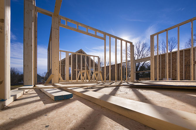 A house in the framing stage of construction